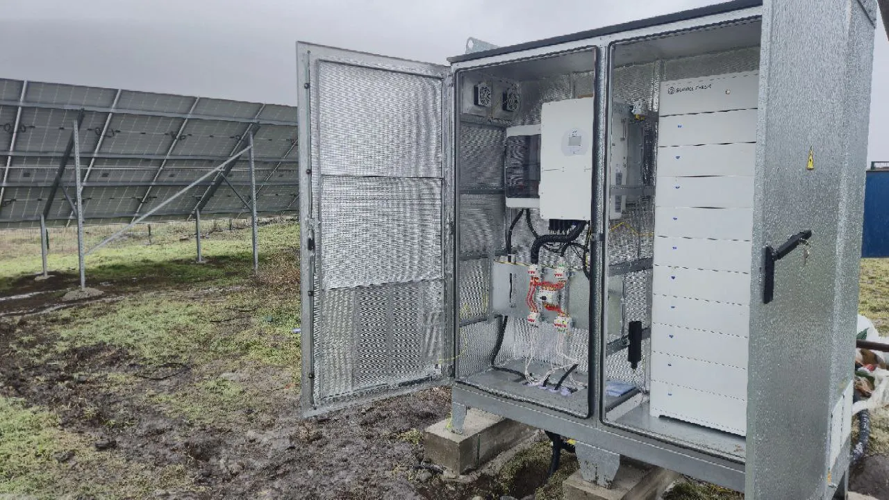 Inside the insulated all-in-one enclosure: hybrid inverter, lithium batteries and starting equipment