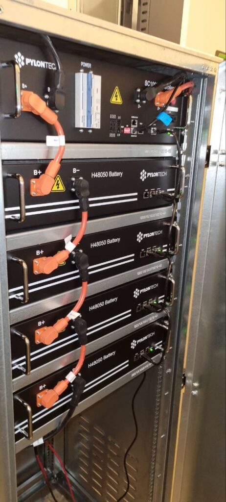BESS battery cabinet with Pylontech lithium iron phosphate modules and power cabling