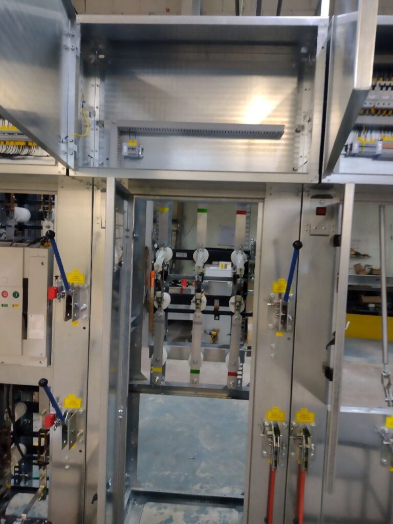 Assembly of 6-10 kV switchgear cells with post insulators in production workshop