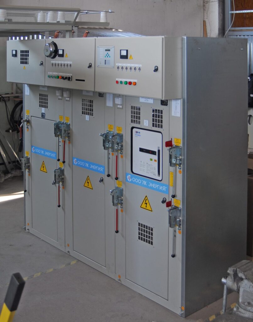 Switchgear section by LK Energy with control and signaling devices on cubicle fronts