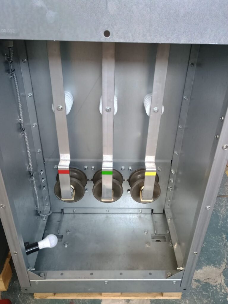 Frame of 6-10 kV switchgear cell with bushing insulators and phase-marked busbars