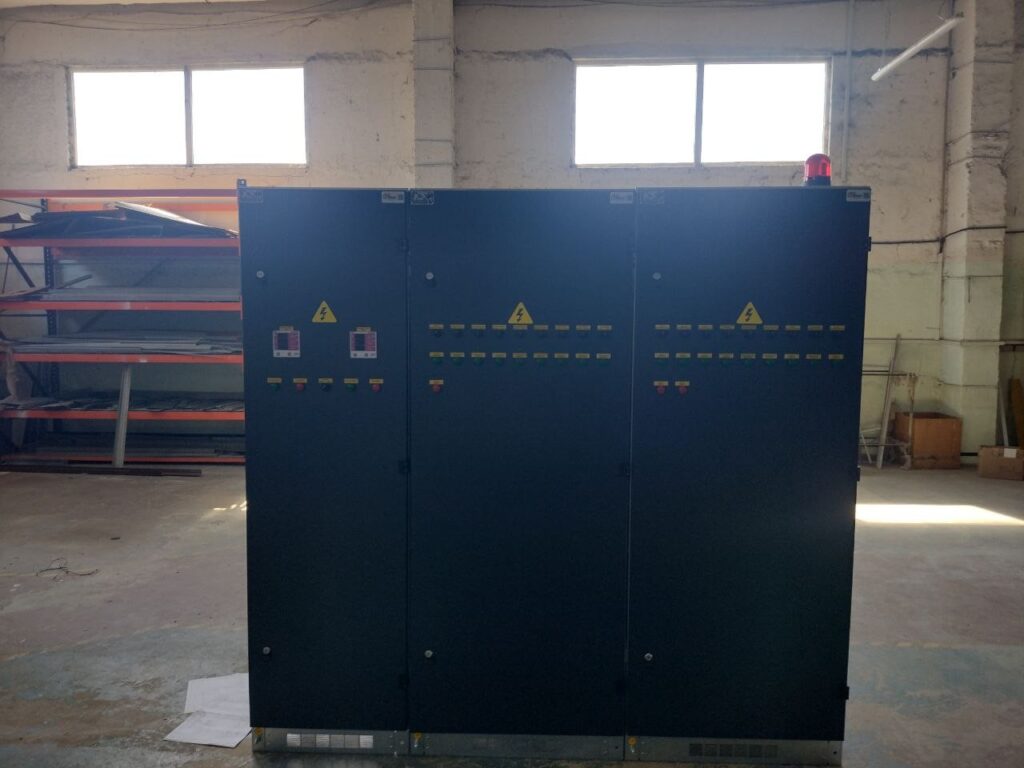 Set of dark grey distribution cabinets with panel meters and signal lamps