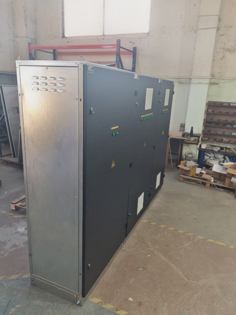 Large assembled switchgear enclosure on the production workshop floor