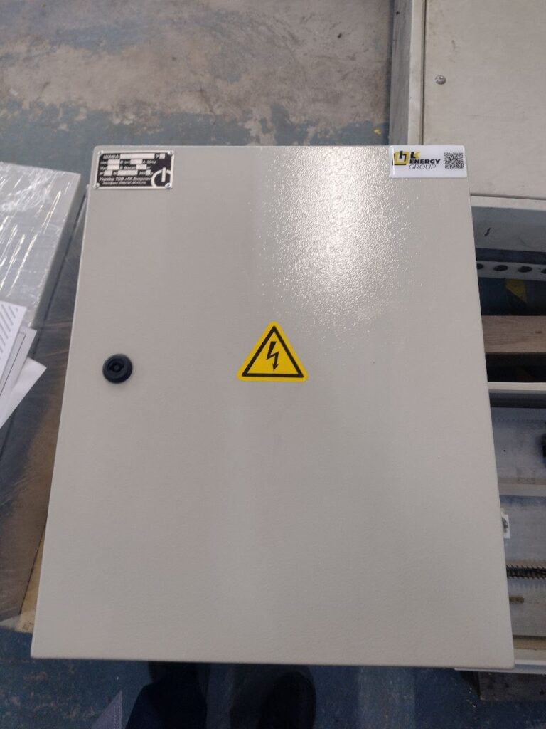 Wall-mounted metal electrical enclosure with nameplate manufactured by LK Energy