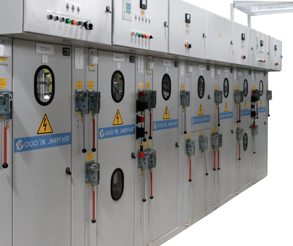 Row of switchgear cubicles with inspection windows manufactured by LK Energy