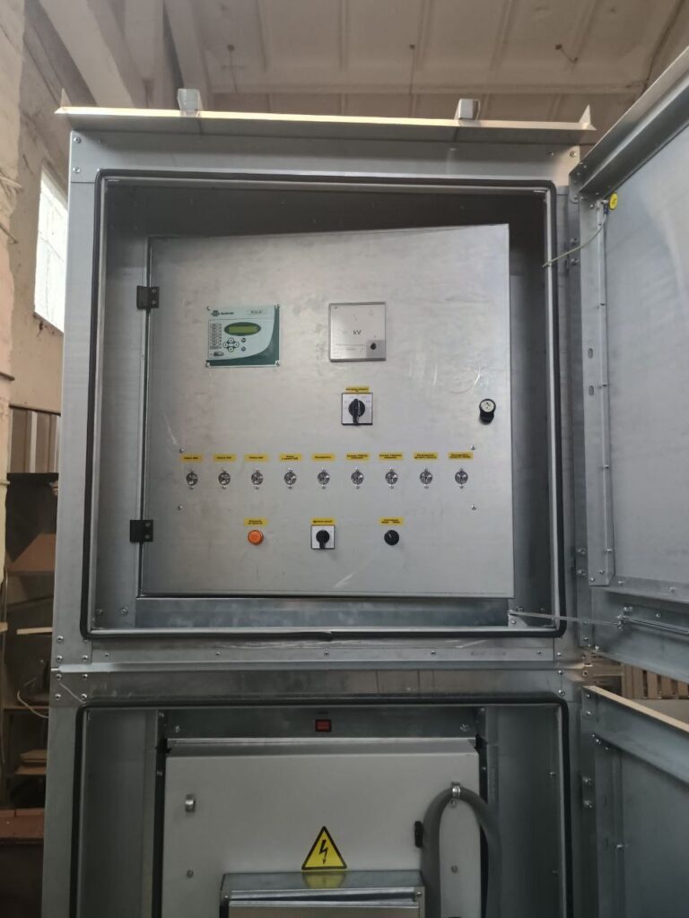 Automation and control cabinet with microprocessor controller and kilovolt meter