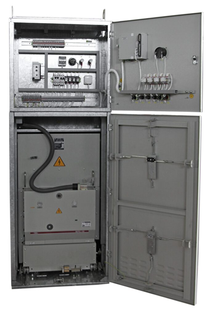 Switchgear cabinet with open doors showing secondary wiring and switching device compartments