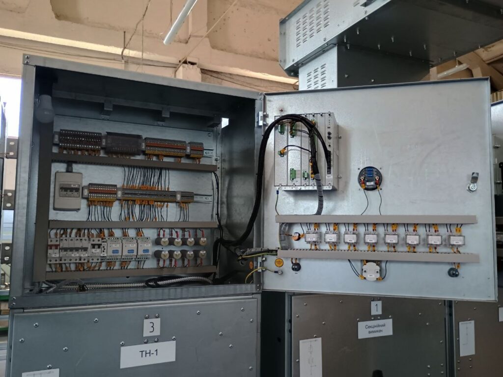 Open protection and automation compartment of voltage transformer cell with terminal blocks