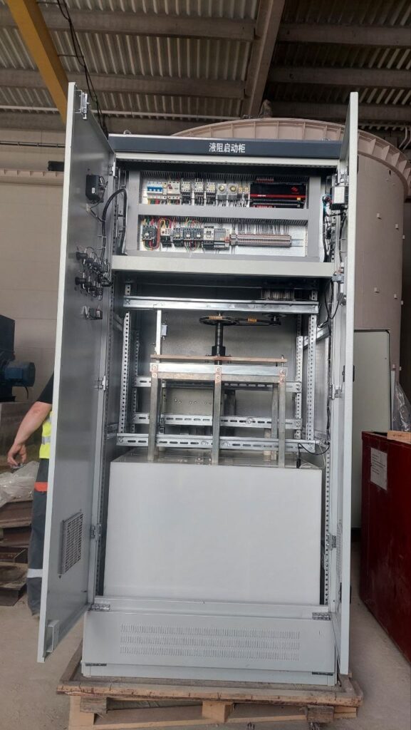 Liquid resistance soft starter cabinet for electric motor with electrolyte tank and controls
