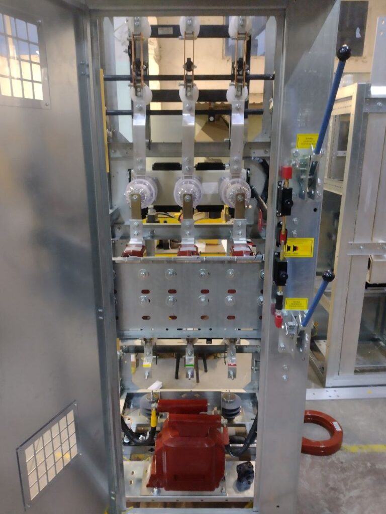 Internal layout of 6-10 kV switchgear chamber with disconnector, insulators and instrument transformer